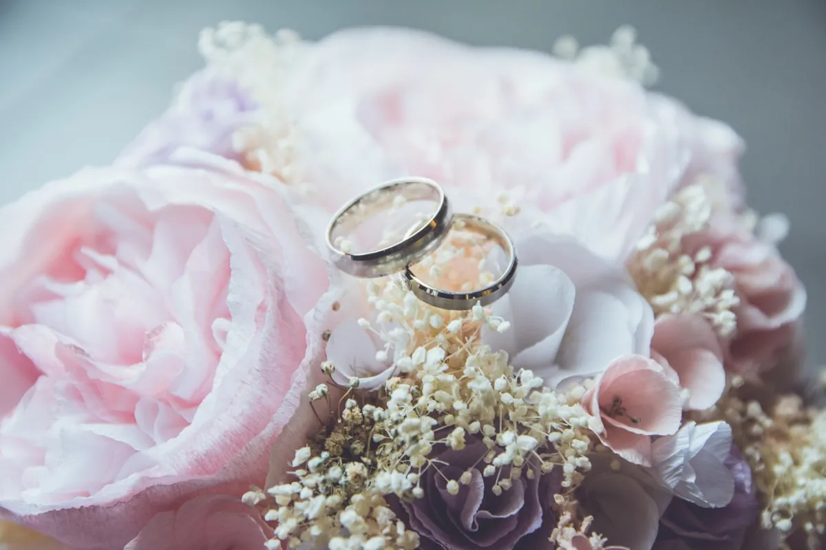 Beautiful engagement ring on flowers