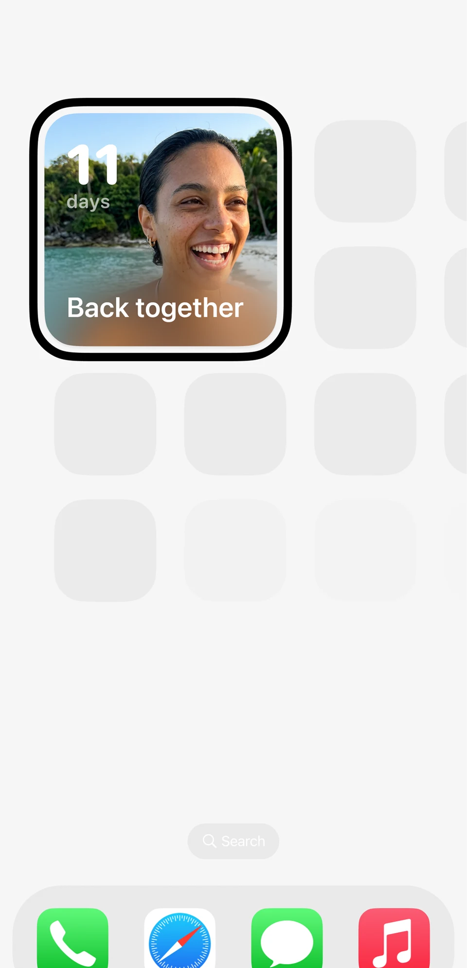 Outside countdown widget on an iPhone Home Screen showing 11 days until being back together